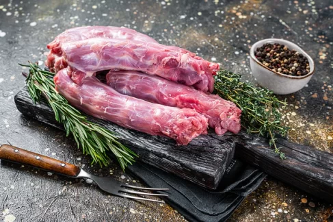 Grassland Sommerlad heritage chicken necks displayed on a slate board