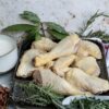 Selection of raw Grassland Sommerlad Heritage chicken portions including wings, marylands, drumsticks, breasts, and offal