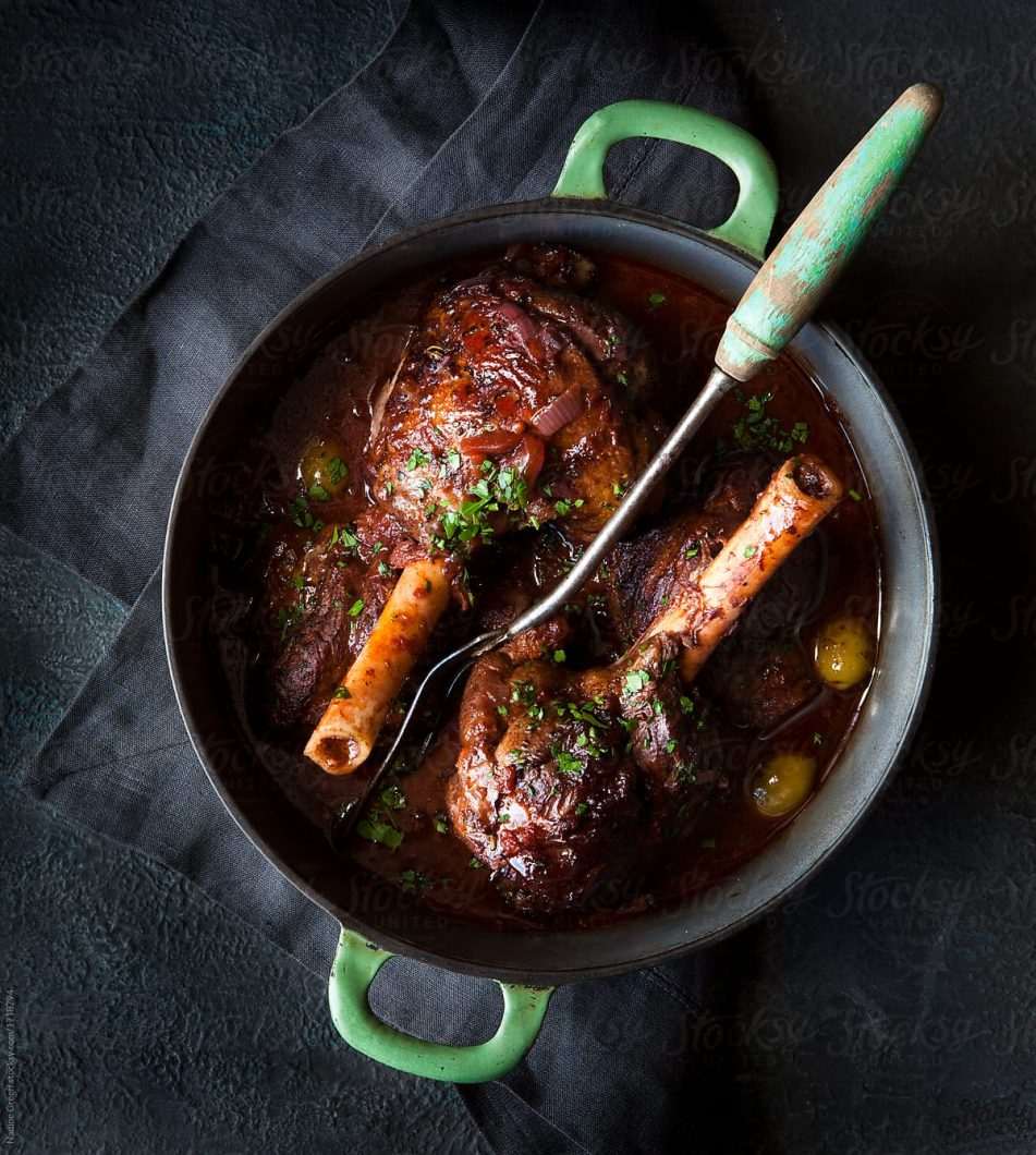 Braised lamb shanks served with creamy mash
