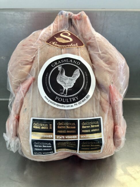 Packaged Sommerlad heritage chicken with award seals, ready for home delivery.