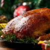 Festive Christmas table with heritage roast meats and seasonal produce