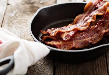 Hand smoked regenerative pastured pork bacon from heritage pigs, raised outdoors on a small family farm. Deep flavour, natural fat, ethically produced. 10kg bacon box.