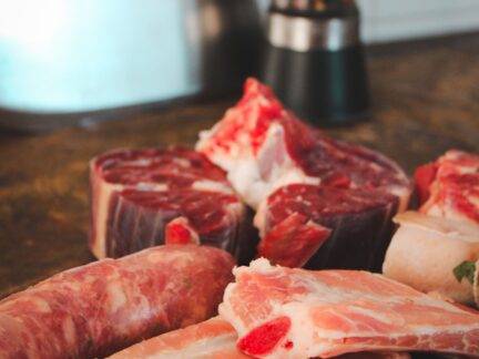 Slow cooked beef bones prepared for making rich homemade broth, showcasing Wuuluman regenerative grass-fed Nguni beef raised on open pasture.